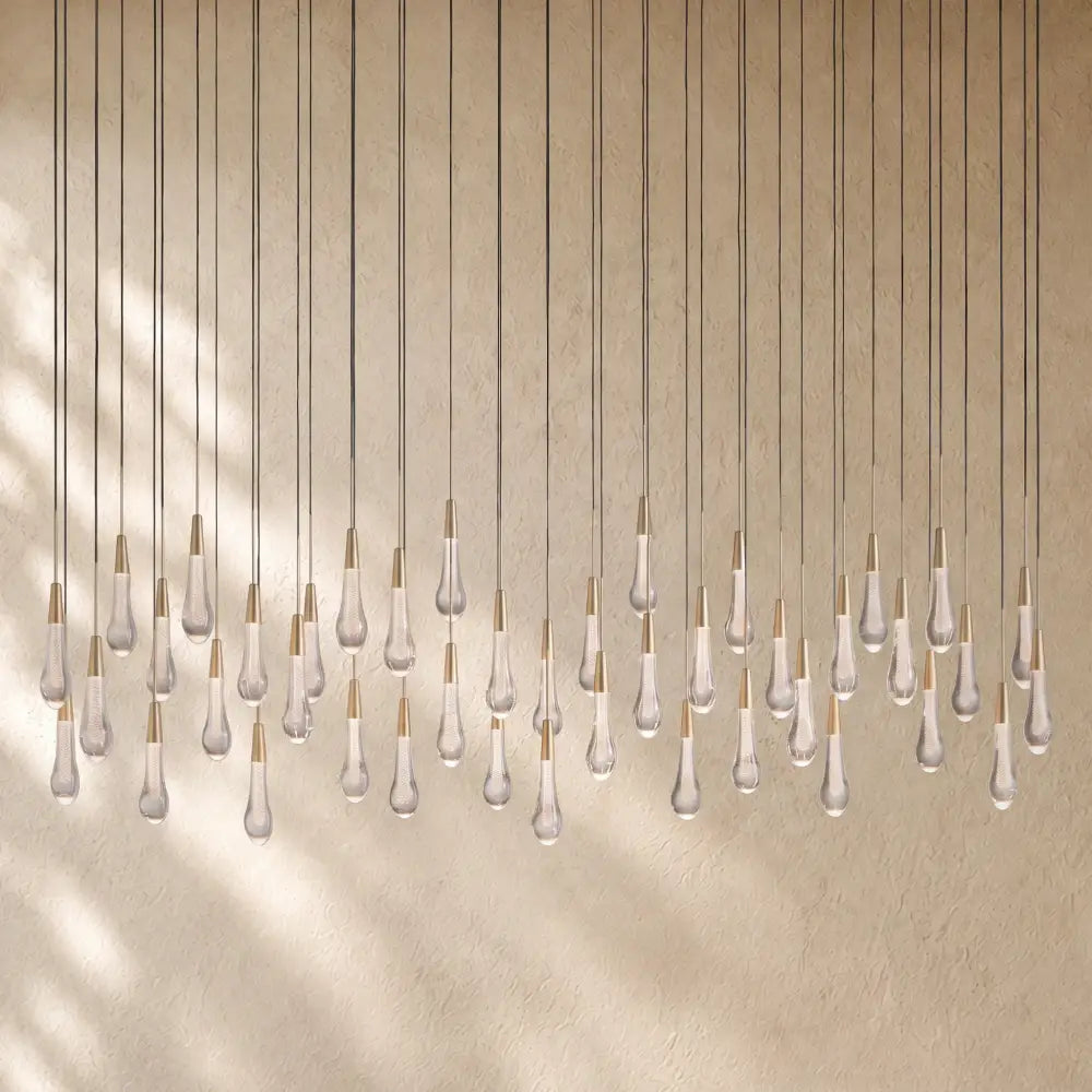 Soltairan Linear Chandelier - Raindrop Pendant Lighting - 70” 42-Light / Brass